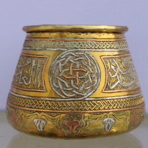 A small pot of Cairoware silver and copper-inlaid, Egypt or Syria, 20th century
